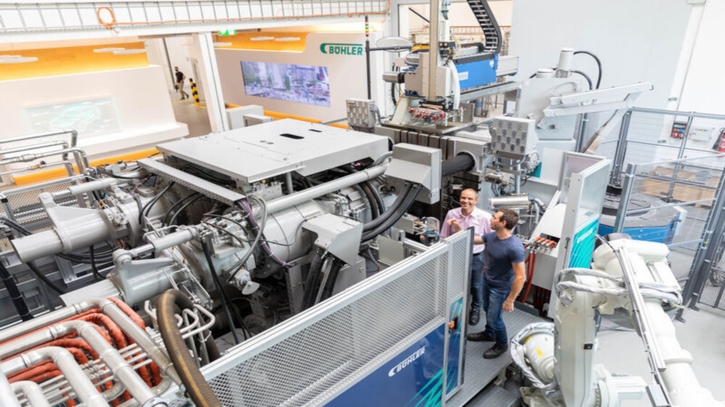 Cornel Mendler next to die casting machines in Uzwil